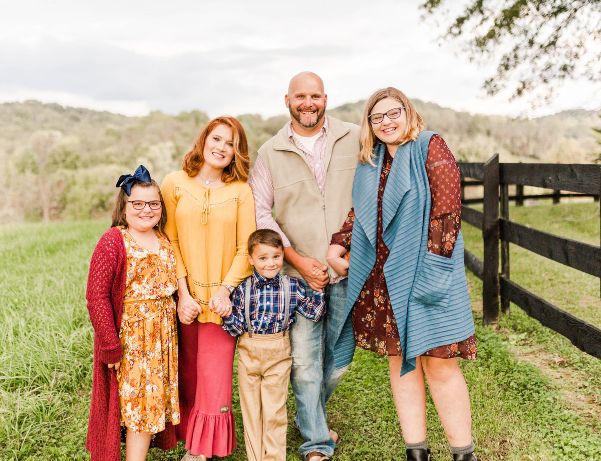 Family of five poses for portraits on Georgia farm