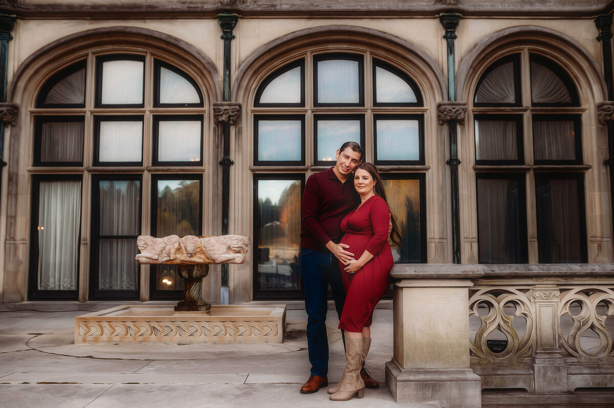 Expectant parents pose for Maternity Session at Biltmore Estate in Asheville, NC.
