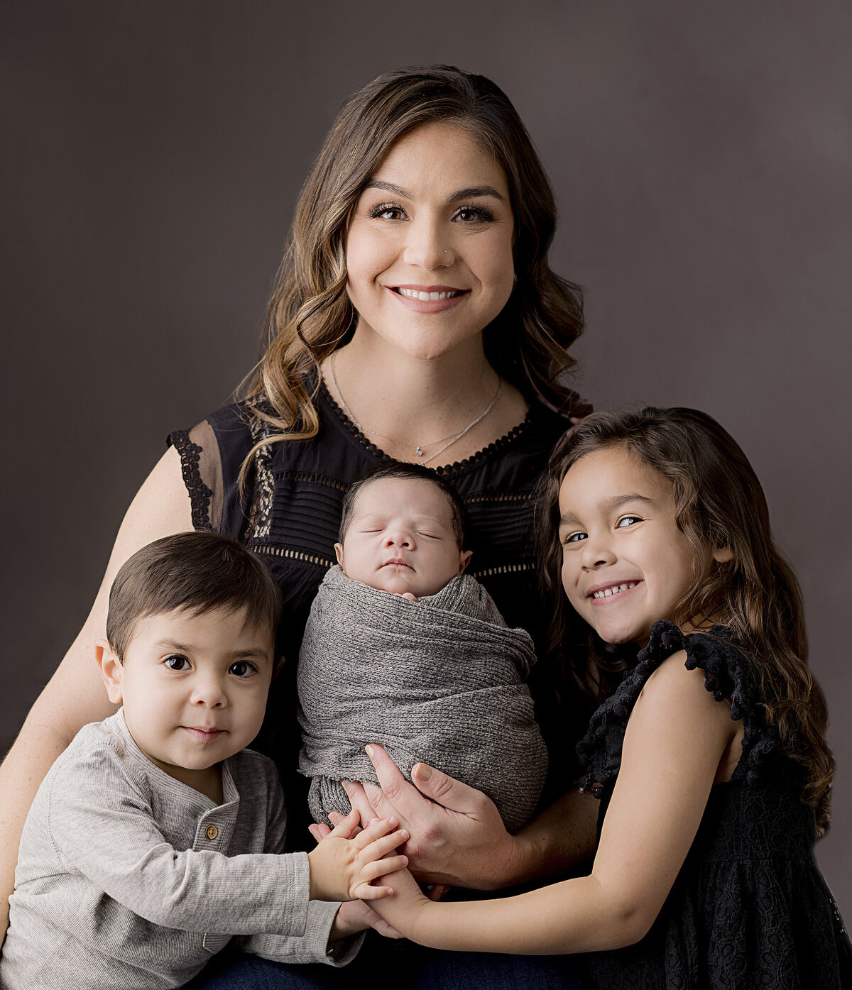 mom with 3 kids newborn session