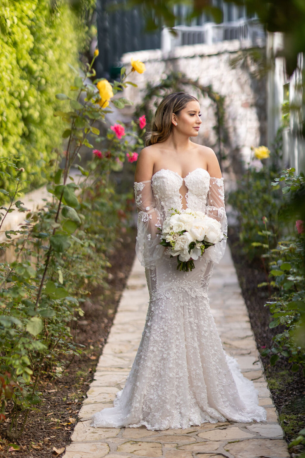 Bride alone  at the rose garden