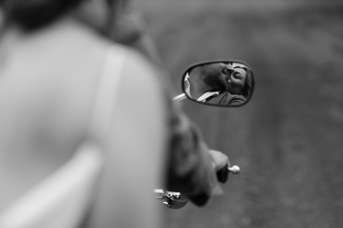 Bride and groom on a motorcycle after their Kauai elopement