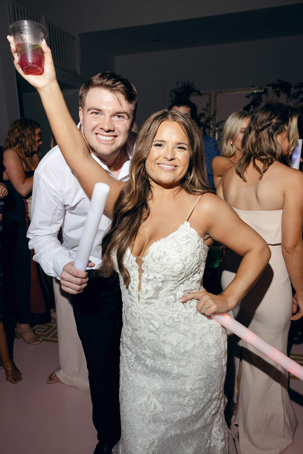 A wedding photo of the bride and groom dancing during the wedding reception