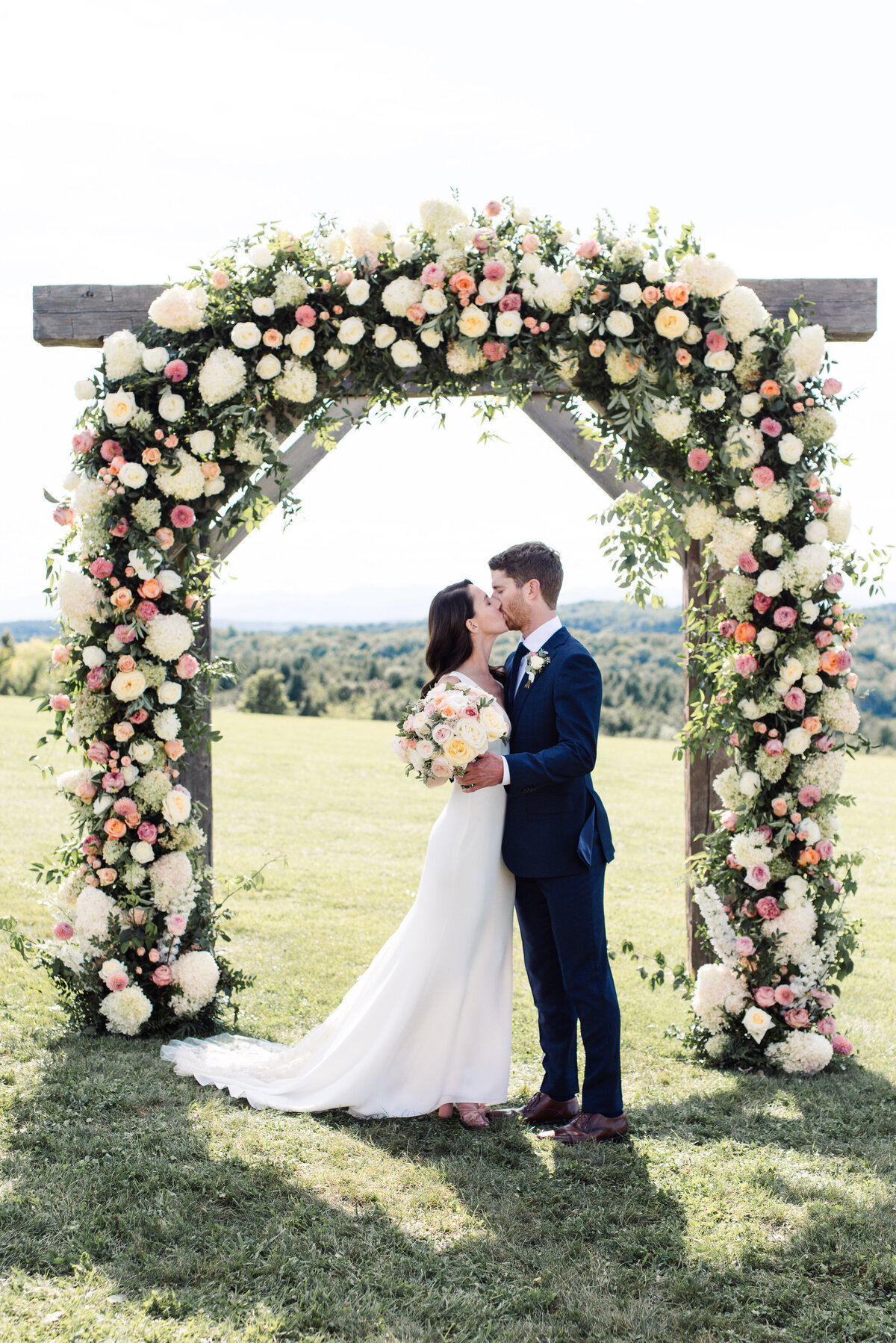 Fabulous wedding arch by Clayton Floral at Maquam Barn and Winery in Vermont