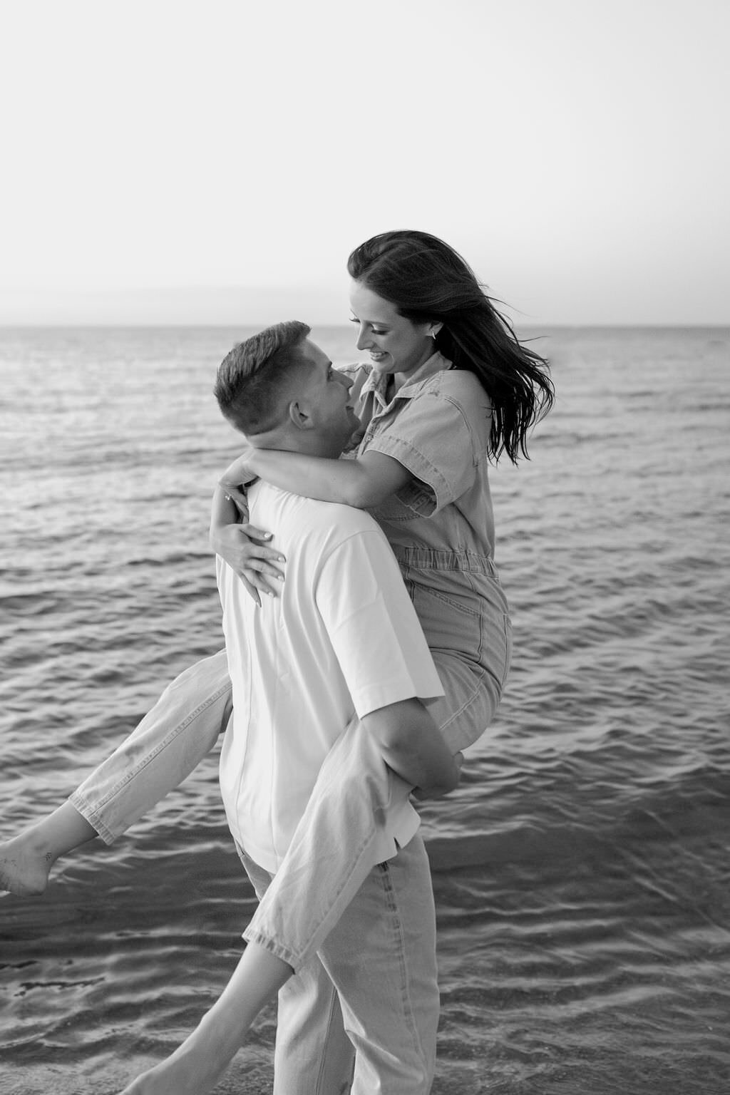 An engagement photography session at The Wrigley Building and North Ave Beach in Chicago, Illinois - 37