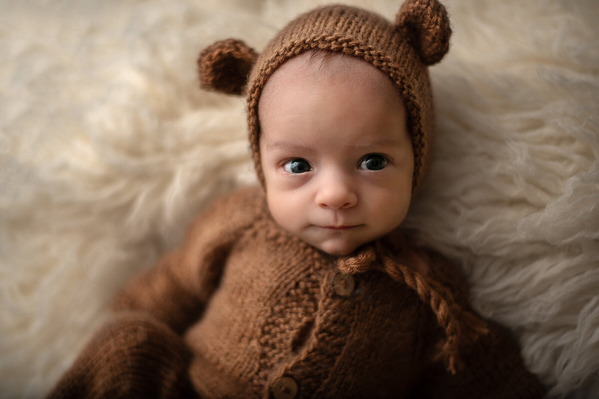 baby in a bear outfit