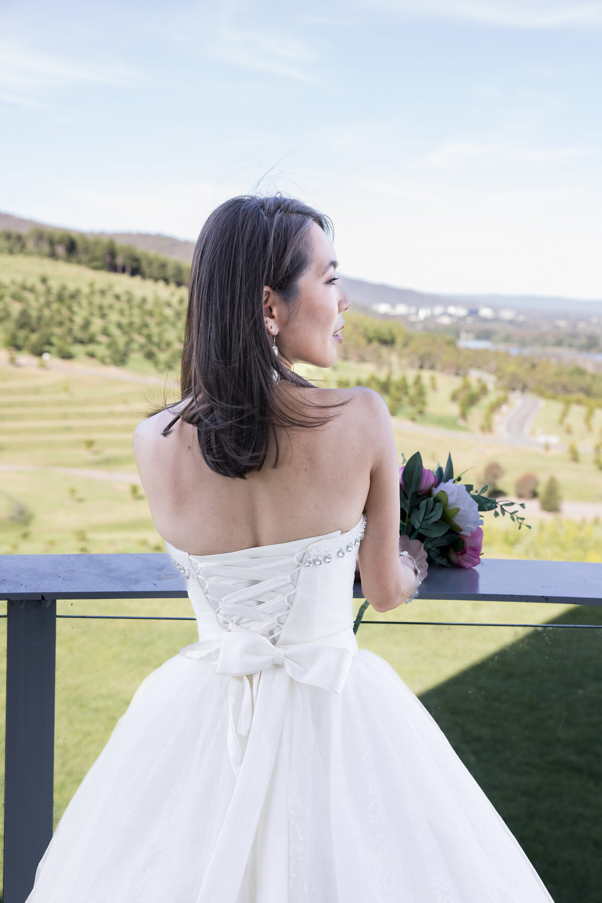 bride looking out over hill