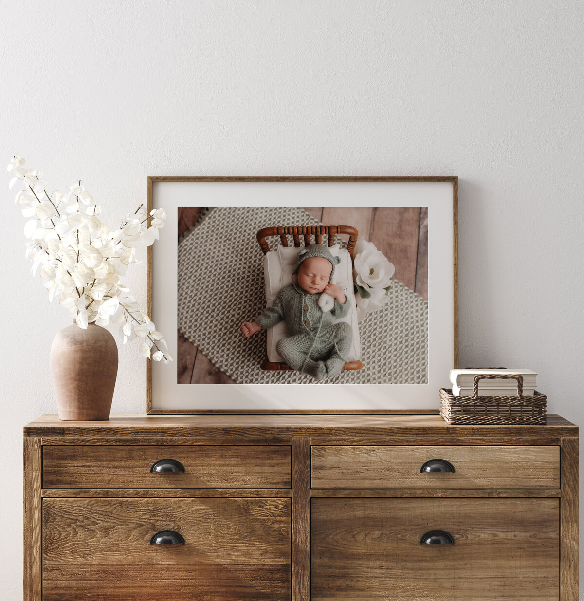 Parents embrace their infant during Newborn Photoshoot in Charleston, SC.
