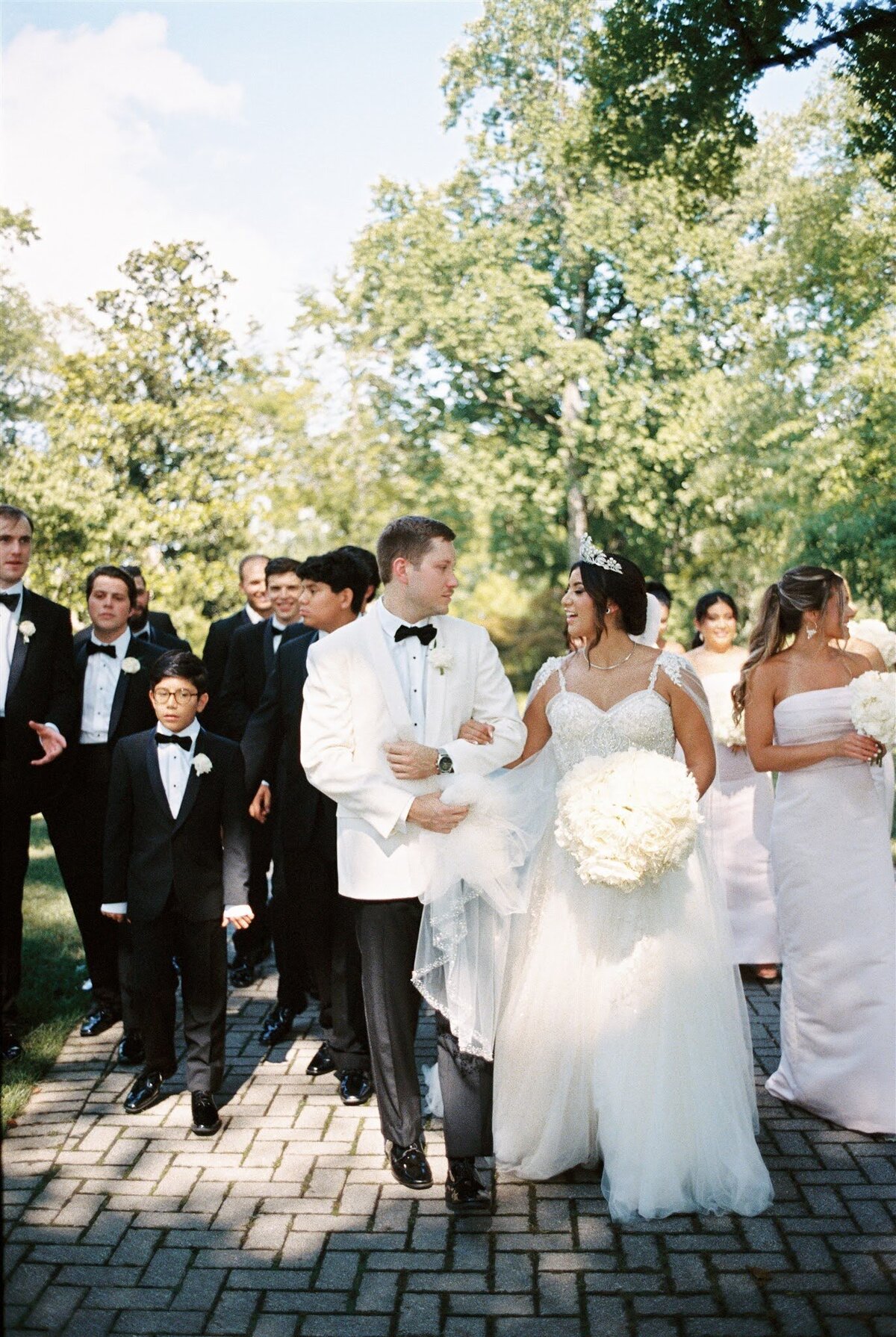 Ivory White floral bride bouquet bridesmaids white tuxedo