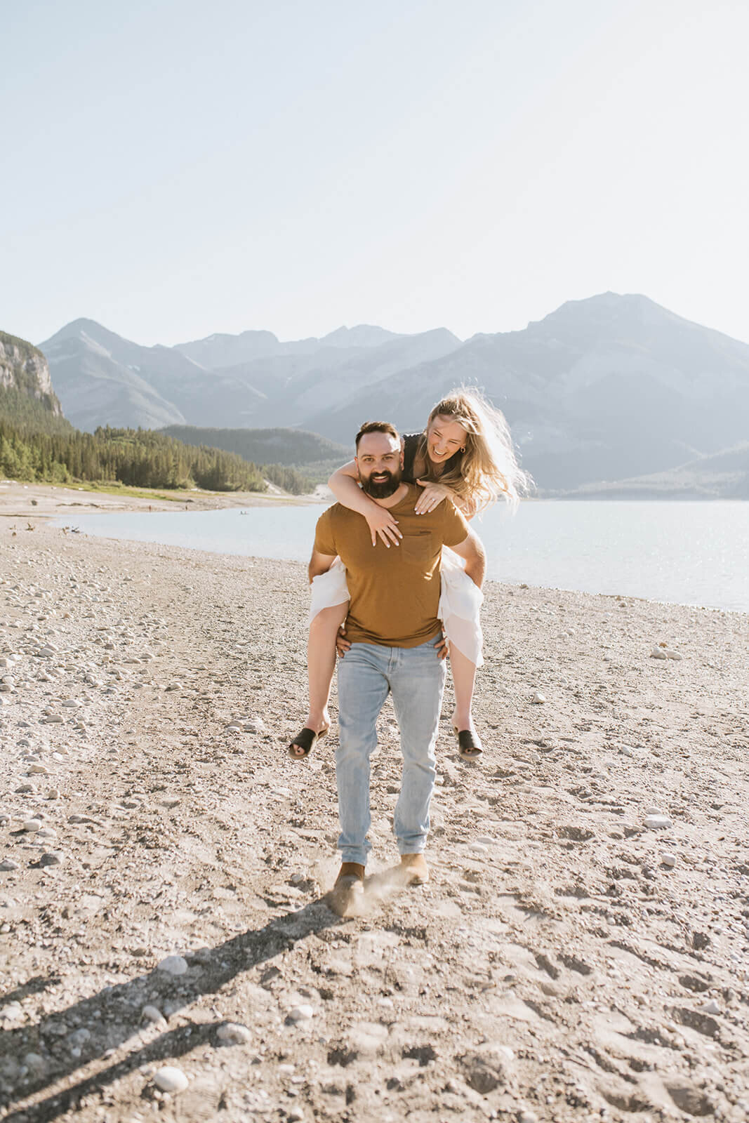 Man-giving-woman-piggy-back-ride