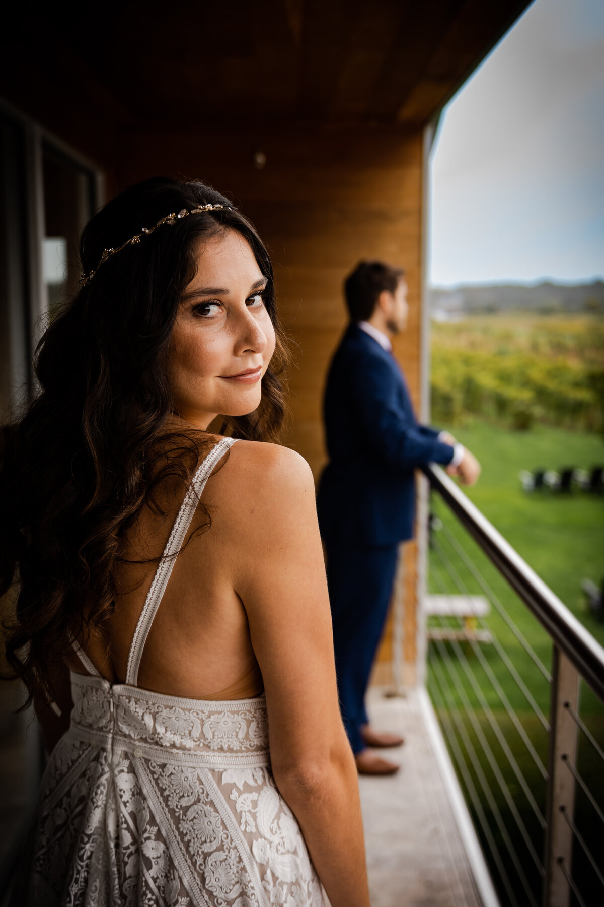 Photograph of a Bride and Groom on their wedding day at Saltwater Farm Vineyard.