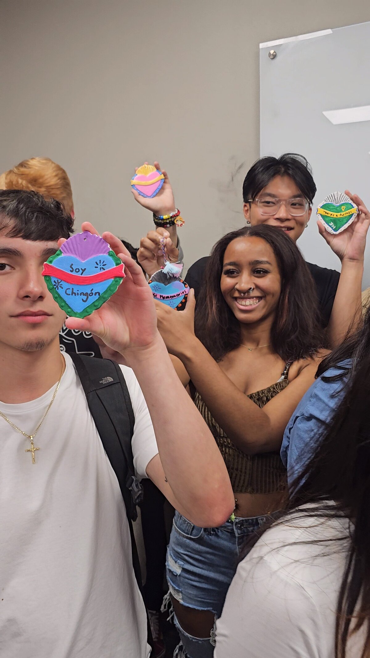 The collective achievement as a group of participants proudly presents the final products from the art workshop conducted by the creator of Soleil Vida Studio.