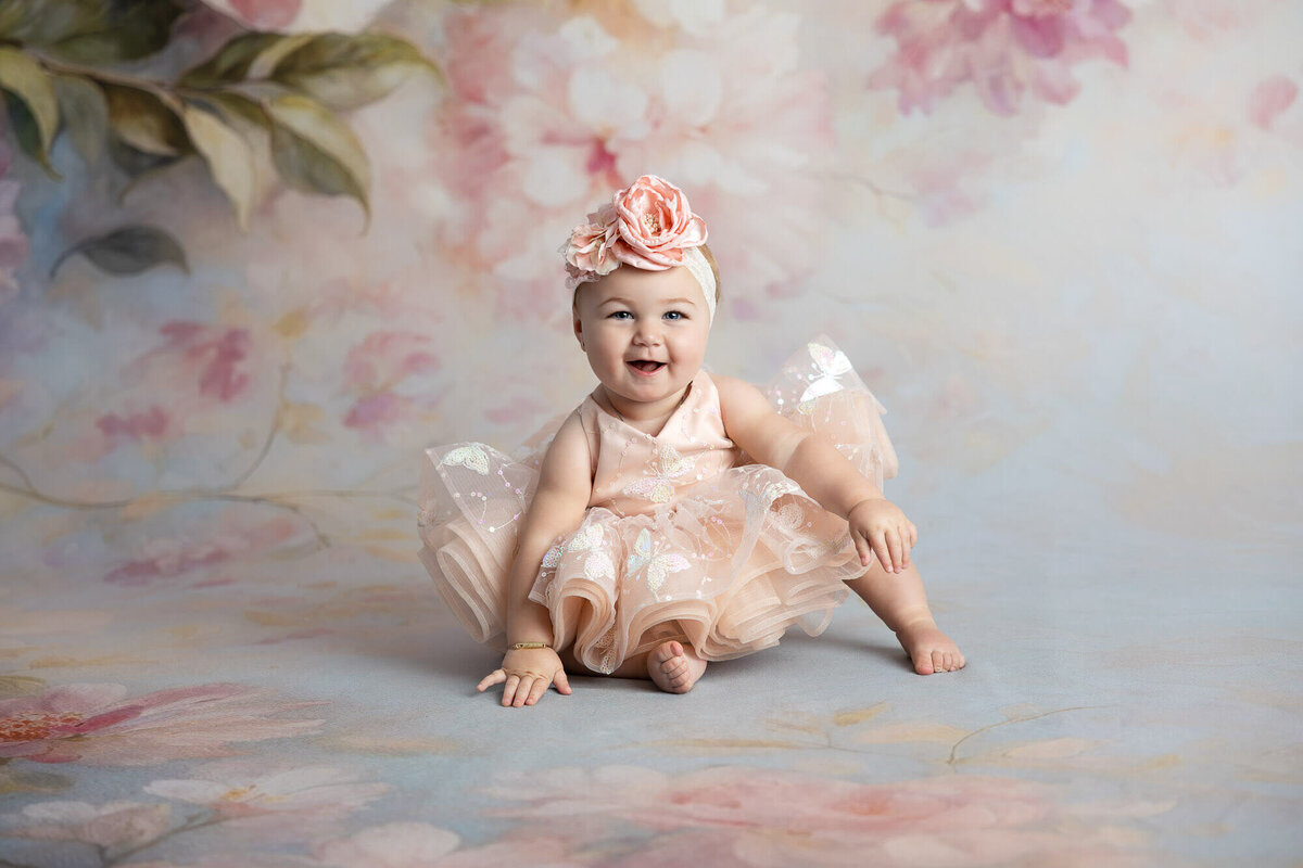 Young girl in pink dream dress during fine art session in La Vernia