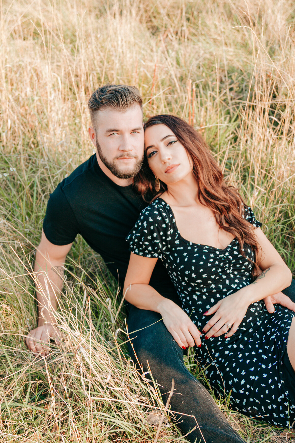 hot-couple-in-grass-field