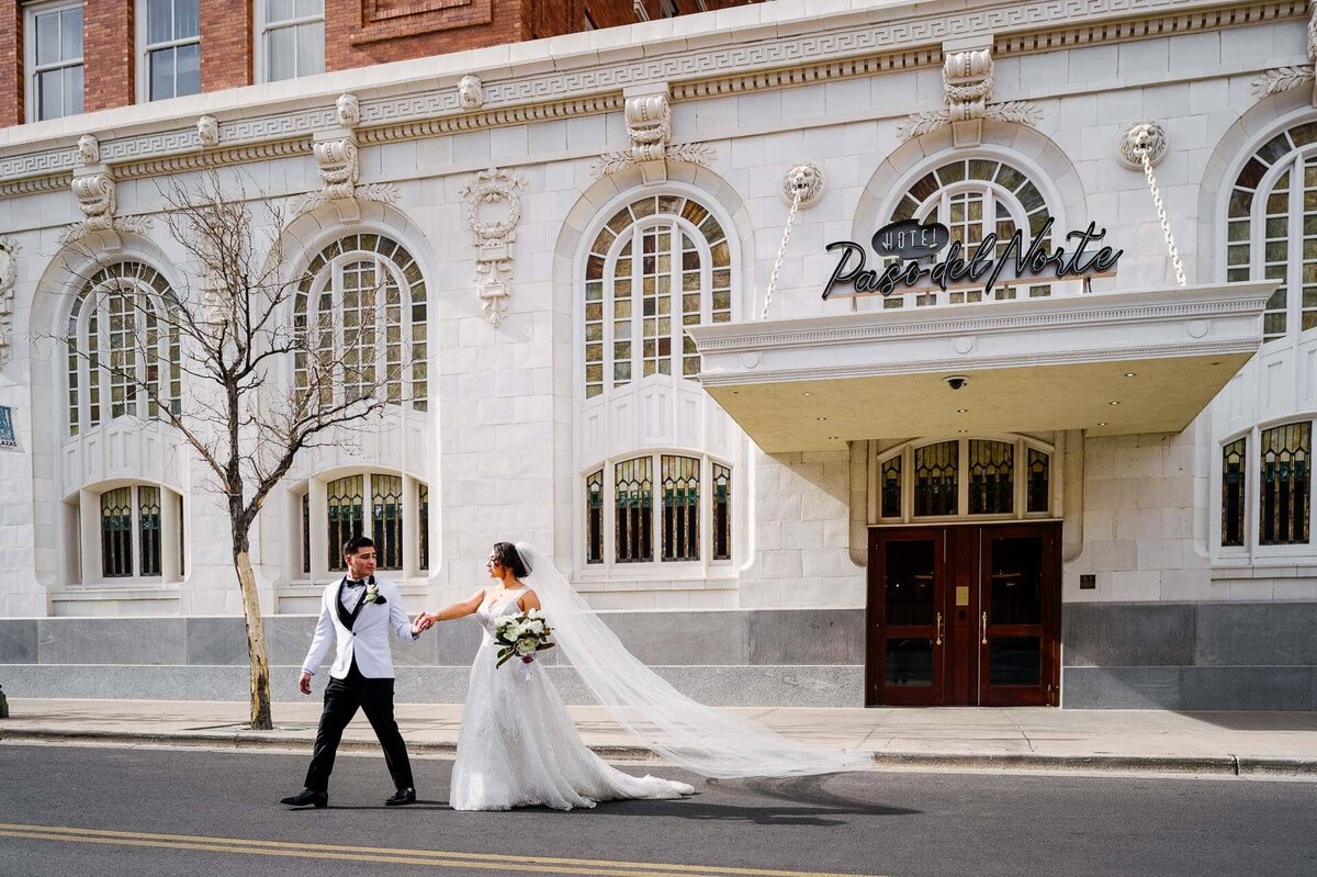 bride and groom walking in downtown el paso texas