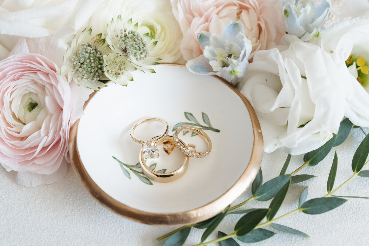 Detail flat lay with wedding rings and stationery at Waverly Oaks