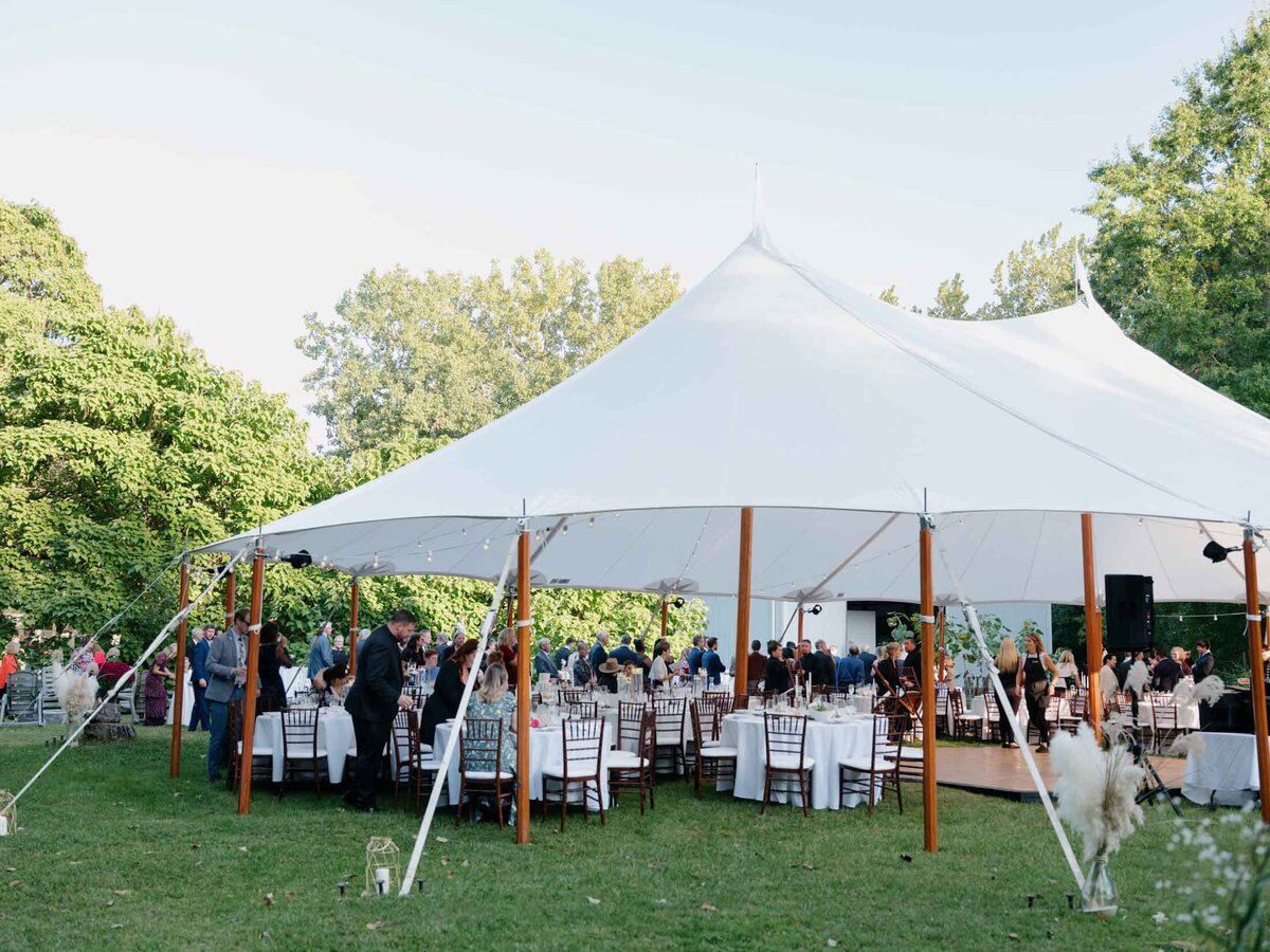 Elegant tented reception at private estate wedding