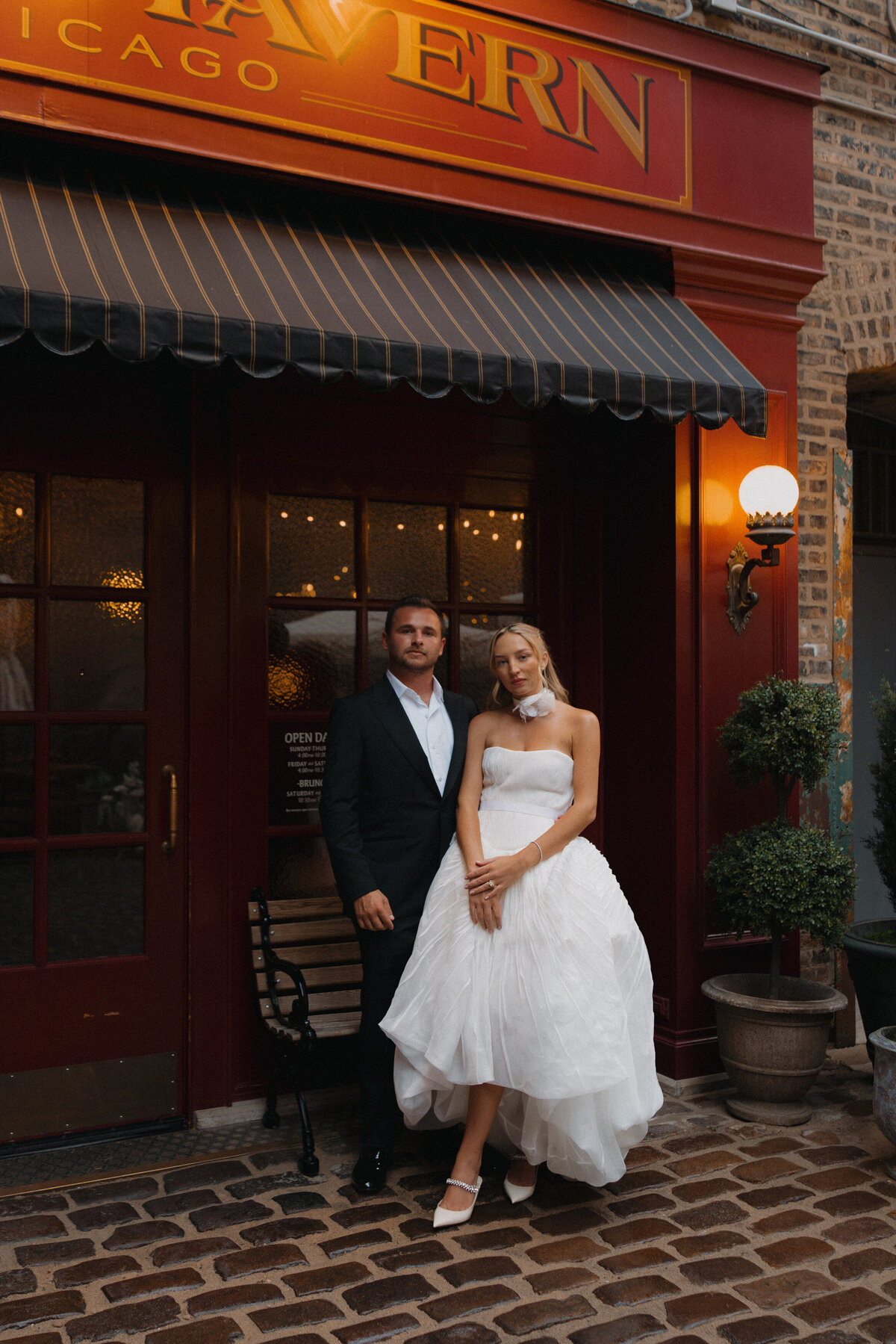 Sophisticated editorial wedding photography at Trivoli Tavern Chicago featuring Lauren Alatriste's fashion forward approach to reception coverage, creating magazine-worthy imagery that combines celebration energy with luxury wedding aesthetics.