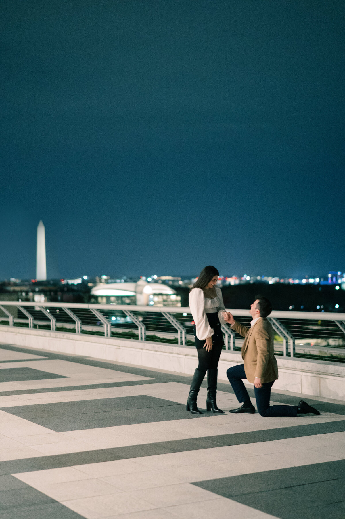 kennedy center rooftop surprise proposal photo by  dc proposal photographer