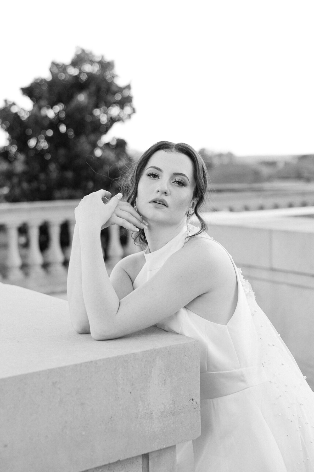 a woman posing in her wedding dress
