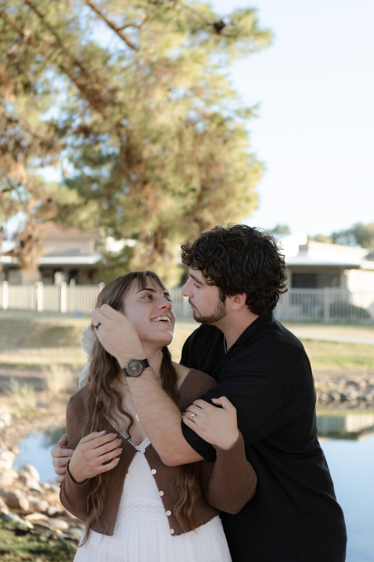 Jovanna G Photography. Classic, sophisticated Wedding Photos. Soft romantic engagement photos. Soft romantic WeddingPhotos. Sophisticated Wedding Photographer. Professional Wedding Photographer. Destination Wedding Photographer. Luxury Wedding photographer. Traveling Wedding Photographer. AZ Wedding Photographer. Gilbert AZ Wedding Photographer. Queen Creek Wedding Photographer. Phoenix Wedding Photographer. Scottsdale Wedding Photographer. Flagstaff Wedding Photographer. SoCal Wedding Photographer. California Wedding Photographer. Northern California Wedding Photographer. Southern California Wedding Photographer. San Francisco Wedding Photographer. Bay Area Wedding Photographer. San Jose Wedding Photographer. Golden Gate Bridge Wedding Photographer. Beach Lover Wedding Photographer. Palace of the Fine Arts Wedding Photographer. Ocean Lover. I love California. Orange County Wedding Photographer. Newport Beach Couples Photographer. Newport Beach Wedding Photographer. Laguna Beach Couples Beach Engagement Photographer. Laguna Beach wedding beach photographer. Los Angeles Wedding Photographer. Young and in love engaged couples who live in southern California. Christian Young Couple. Young Engaged Couple. Engaged High School Christian Couple. Christian Values. Young conservative Christian women. Young Conservative Christian men. Young Conservative Christian Couple. Young Christian Couple Engaged in High School. Young Christian College Couple. Lakeside Lovers in the Autumn Sun. David & Grace - engagement photos. Jovanna G Photographer Engagement Photos. Arizona sun shining through autumn trees- engagement. Chandler, AZ Engagement Photos. Chandler, AZ 2026 bride. Chandler, AZ Wedding Photographer. Chandler, AZ Young Engaged Couple. Girl in her 20s. Engaged Arizona Girl in her 20s. Lakeside Engagement photos. AZ Lakeside Engagement Photos. AZ Weeping Willow Lakeside Proposal. Arizona Lakeside Proposal with weeping willow tree. Detail shot of engagement ring on Arizona Lakeside estate. Chandler, AZ Lakeside Estate Proposal Outfit Inspiration.