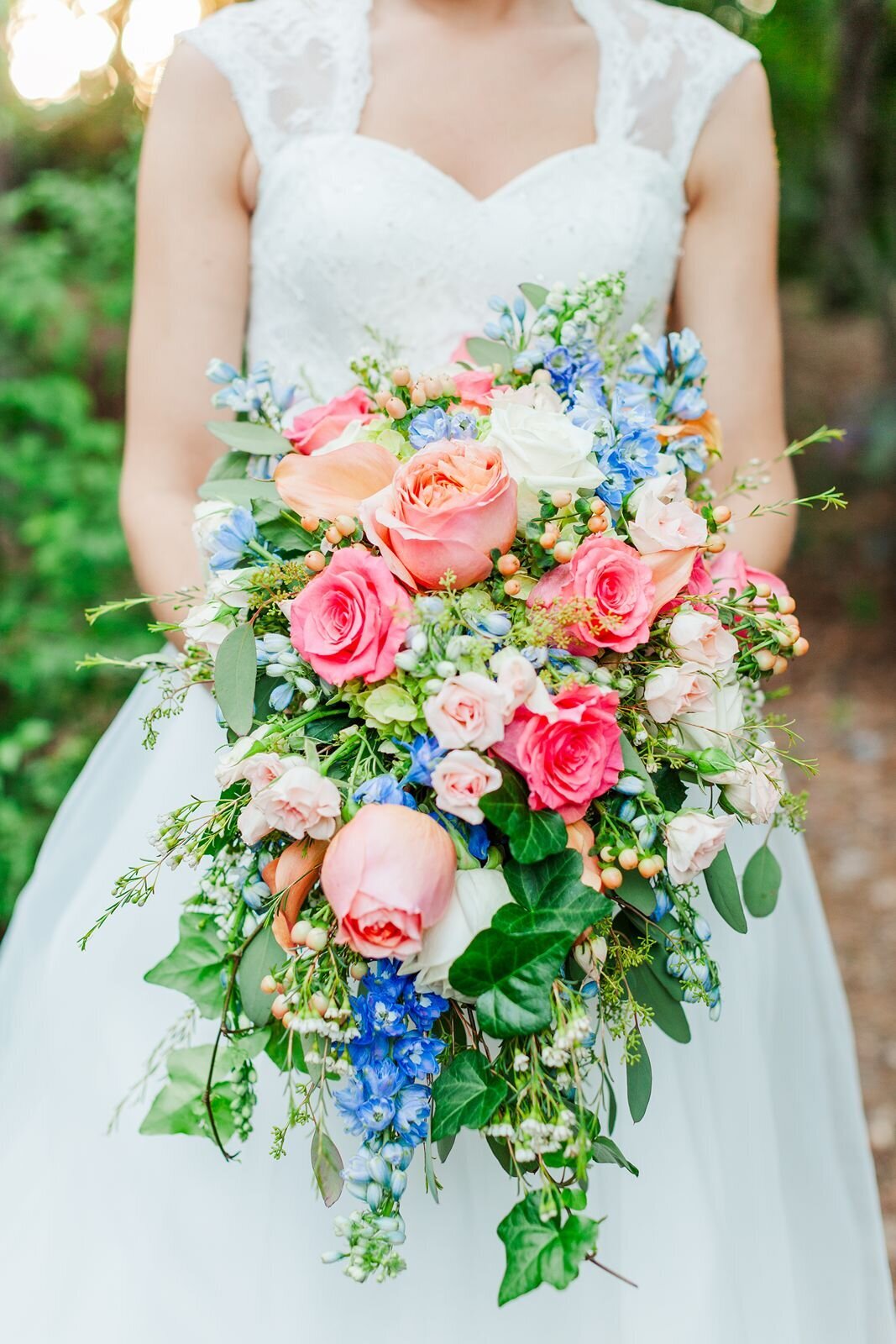 Bride with brightly colored wedding bouquet