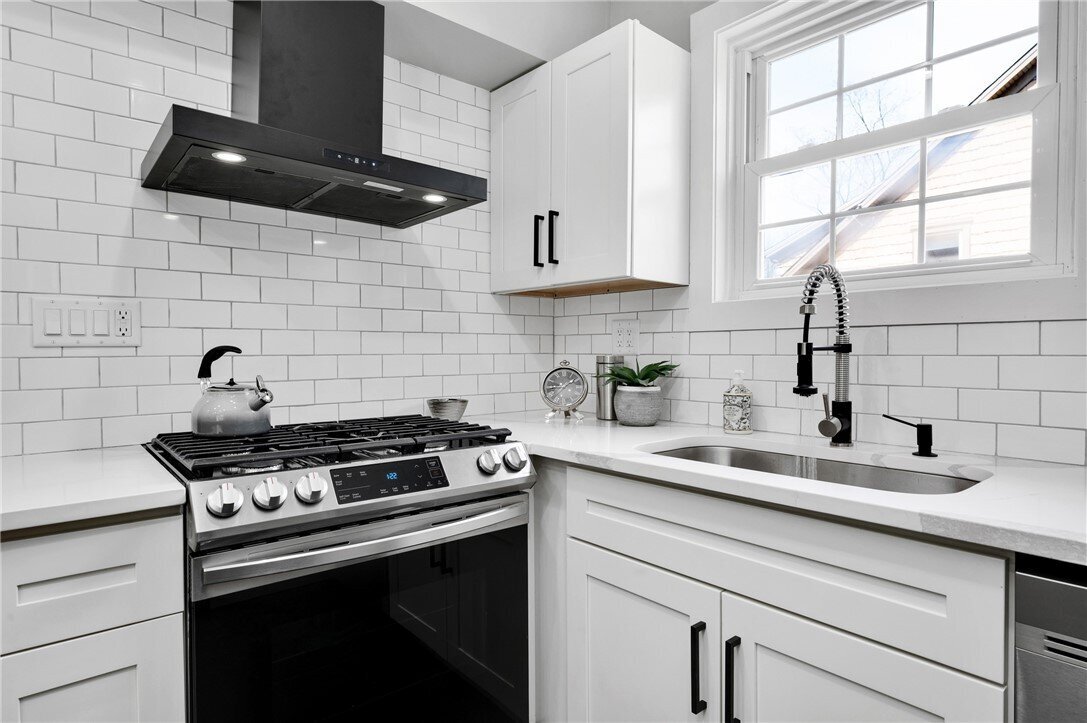 Modern kitchen staging highlighting open-concept living and buyer-focused design