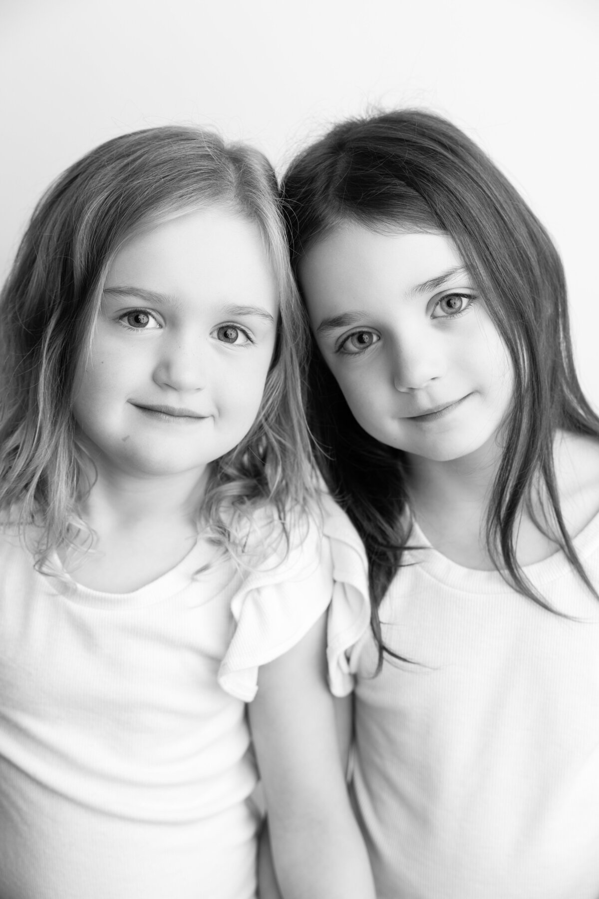 sisters black & white studio portrait 