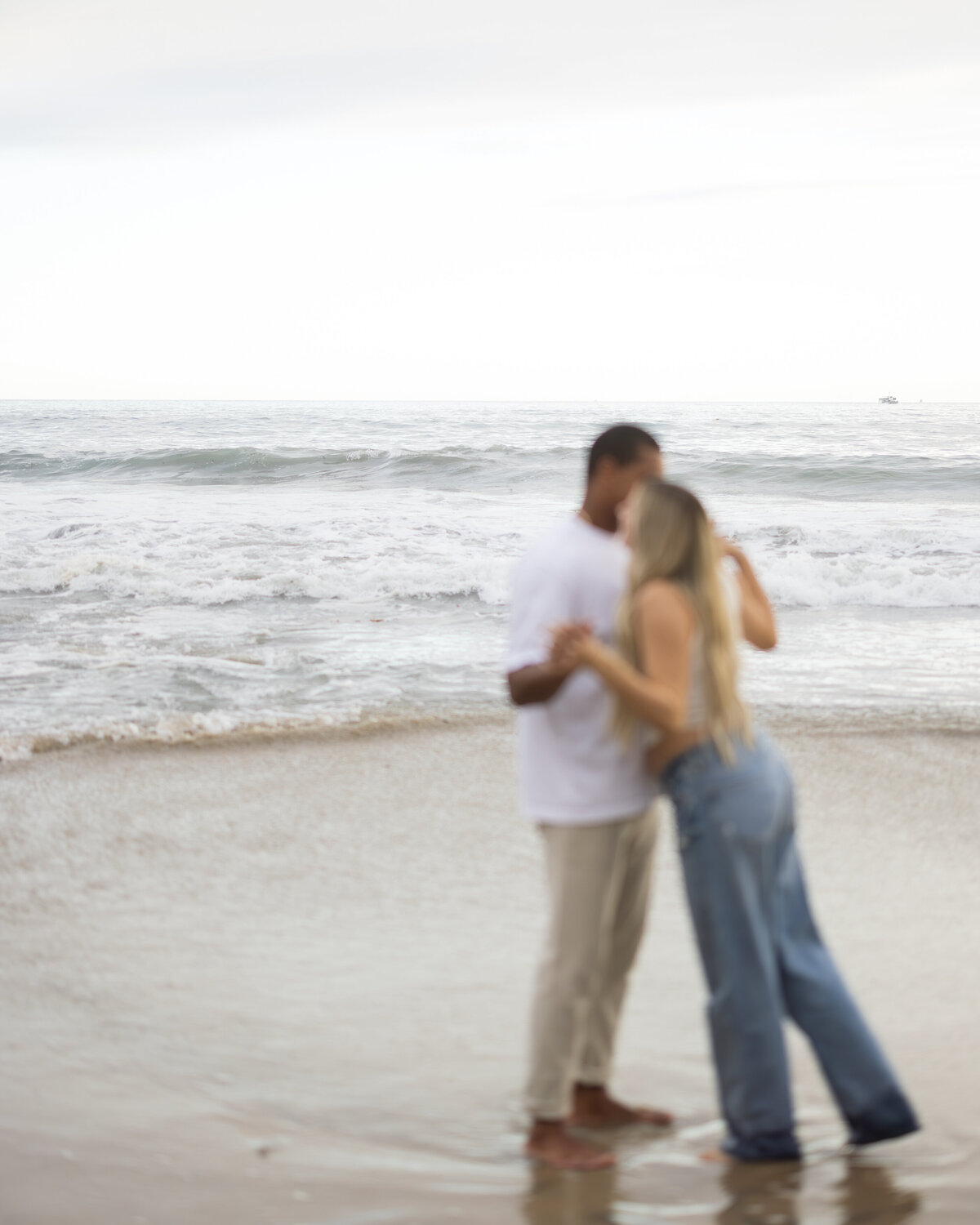 unique couple photo at the beach