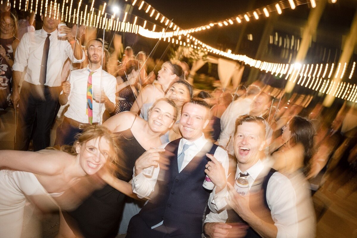 bride-and-groom-sparkler-dance-party-night-jps-events-rooftop.jpg