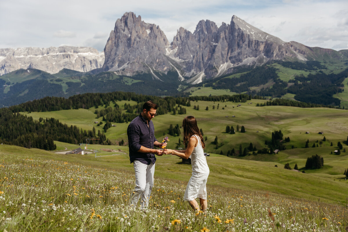 Intimate couple in Scenic Dolomites peaks Alpe di Siusi