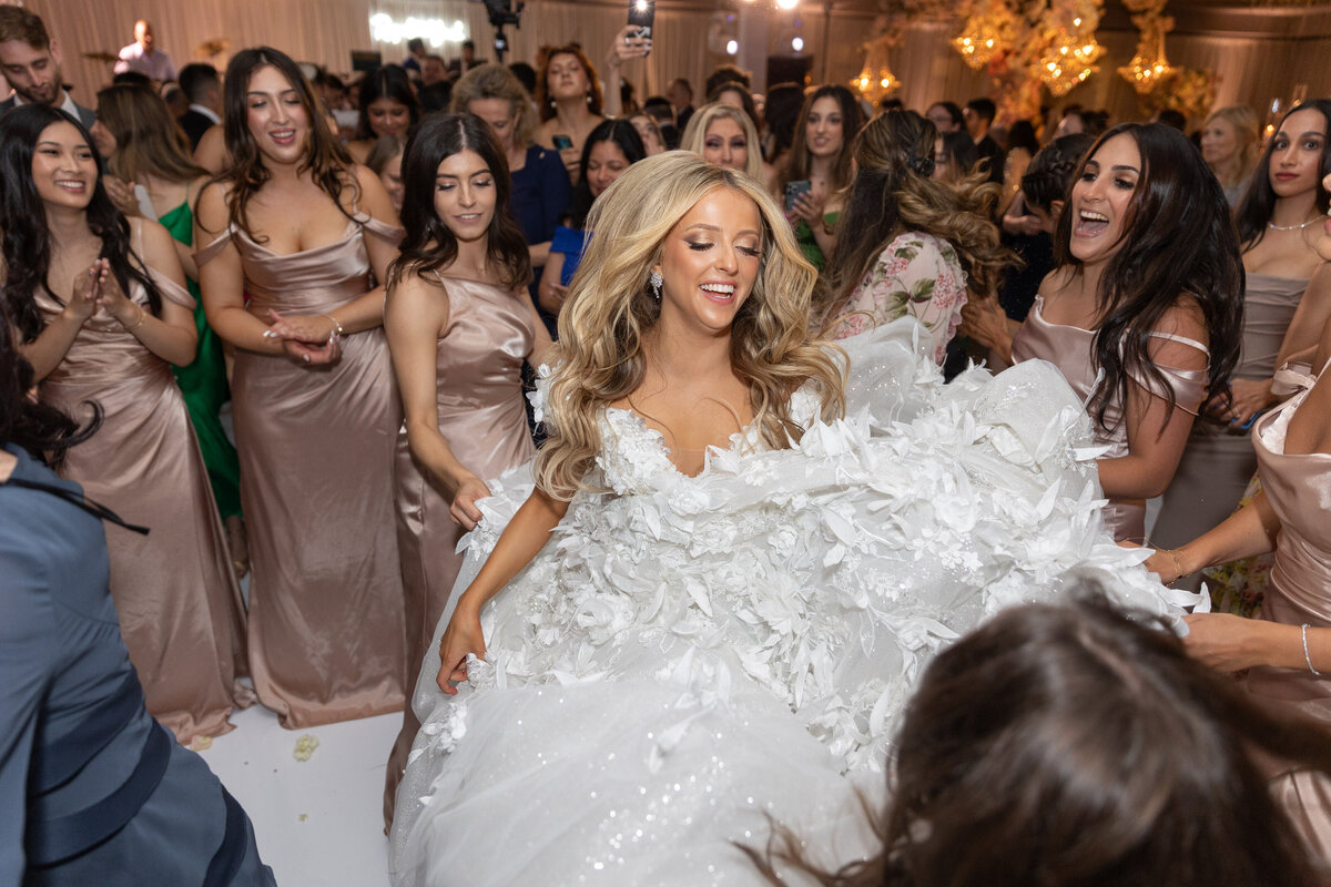 A bride dancing at her wedding reception