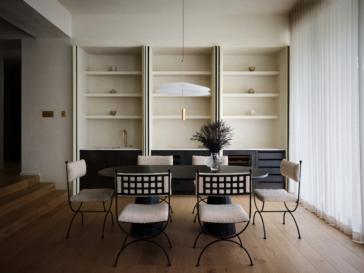 hidden-home-bar-pocket-doors-plaster-warm-oak-natural-light-ceiling-drapery-austin-home-belgian-modern-house-franc