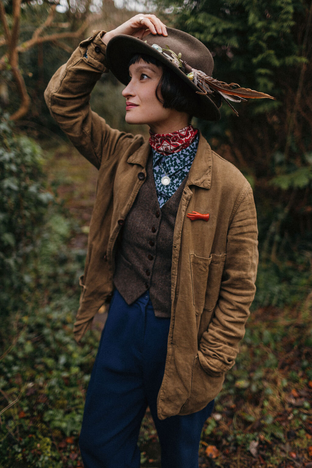 Portrait of Devon based print Artist Rachel Snowdon in her garden at home