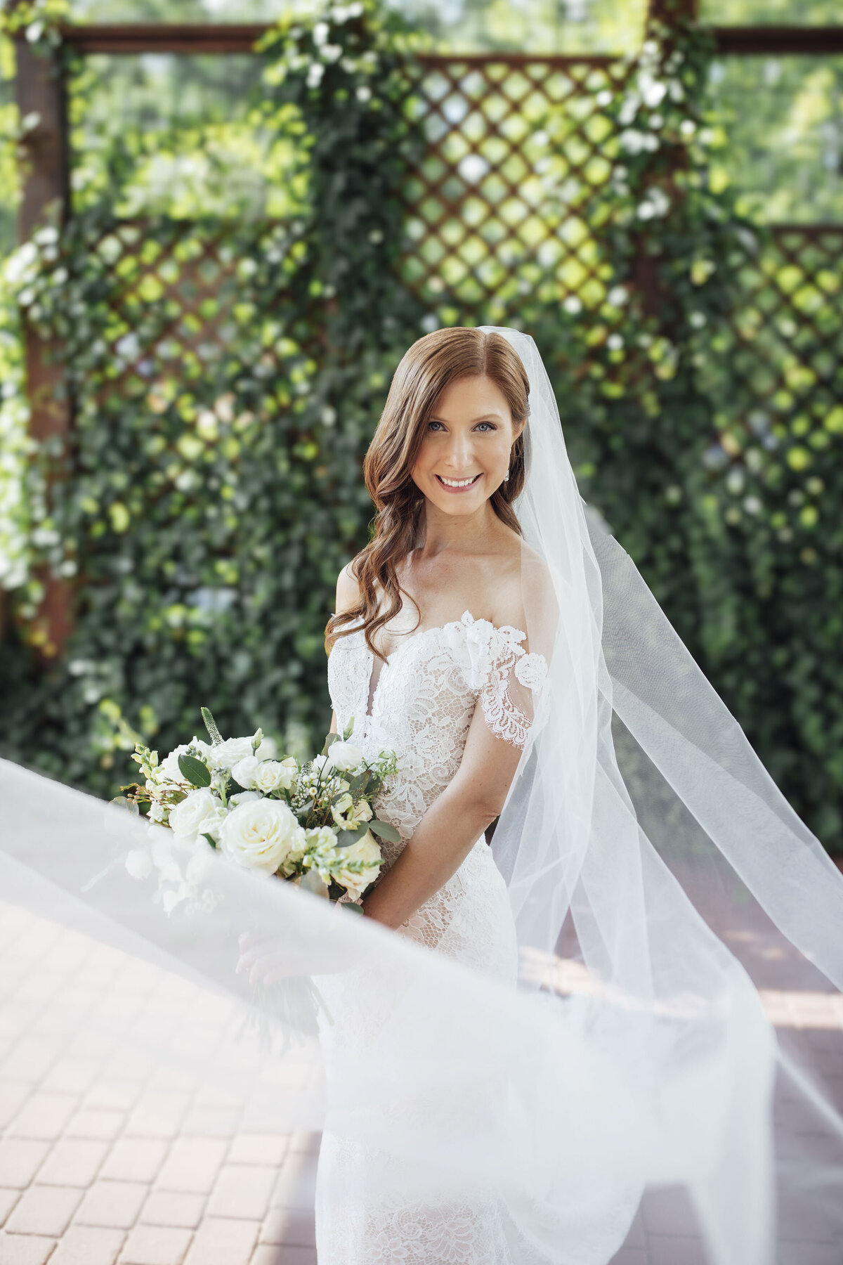 hamilton-manor-summer-wedding-photo-bride-posing-veil-ivy-wall-hamilton-township-new-jersey