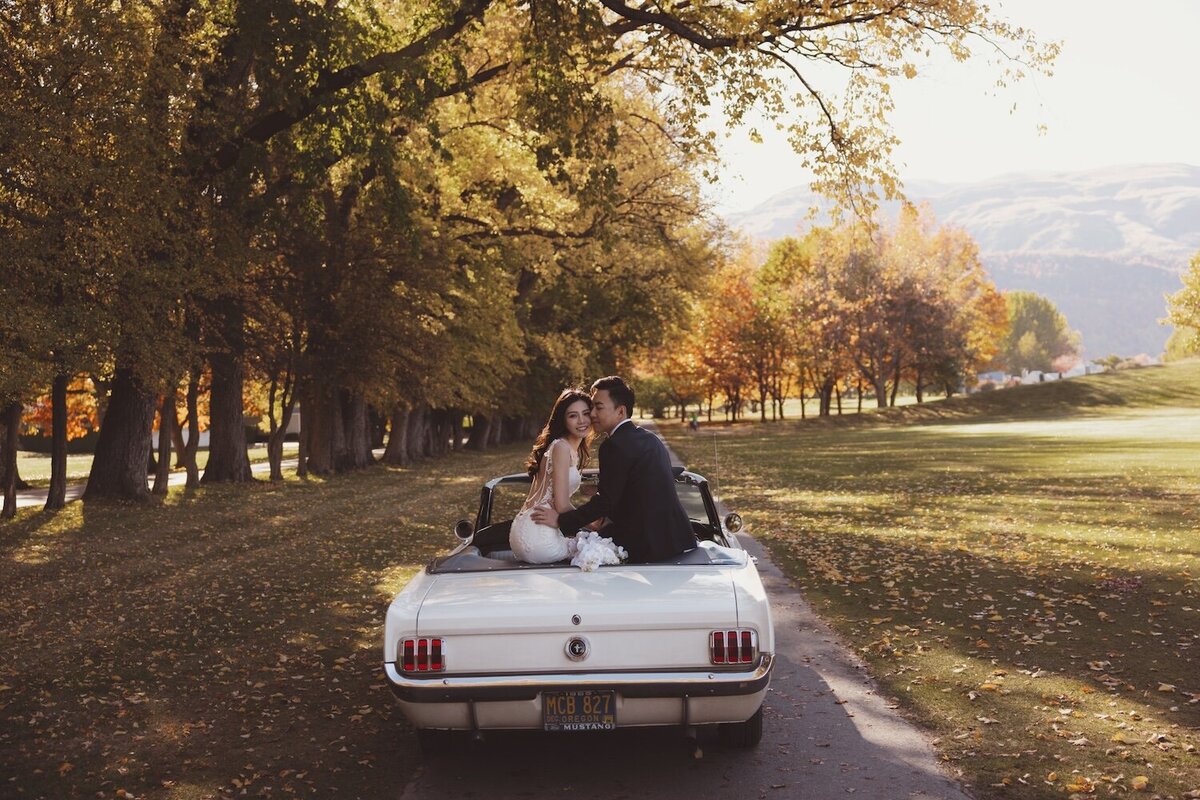 Autumn wedding shoot at Millbrook, Arrowtown. Vintage car & helicopter.