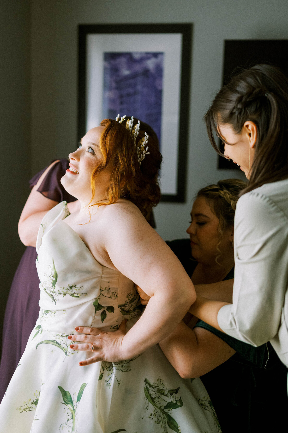 bride-getting-dress-zipped