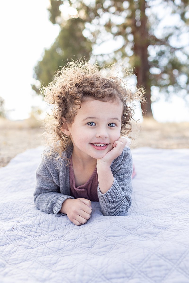 Cute toddler girl with curly hair