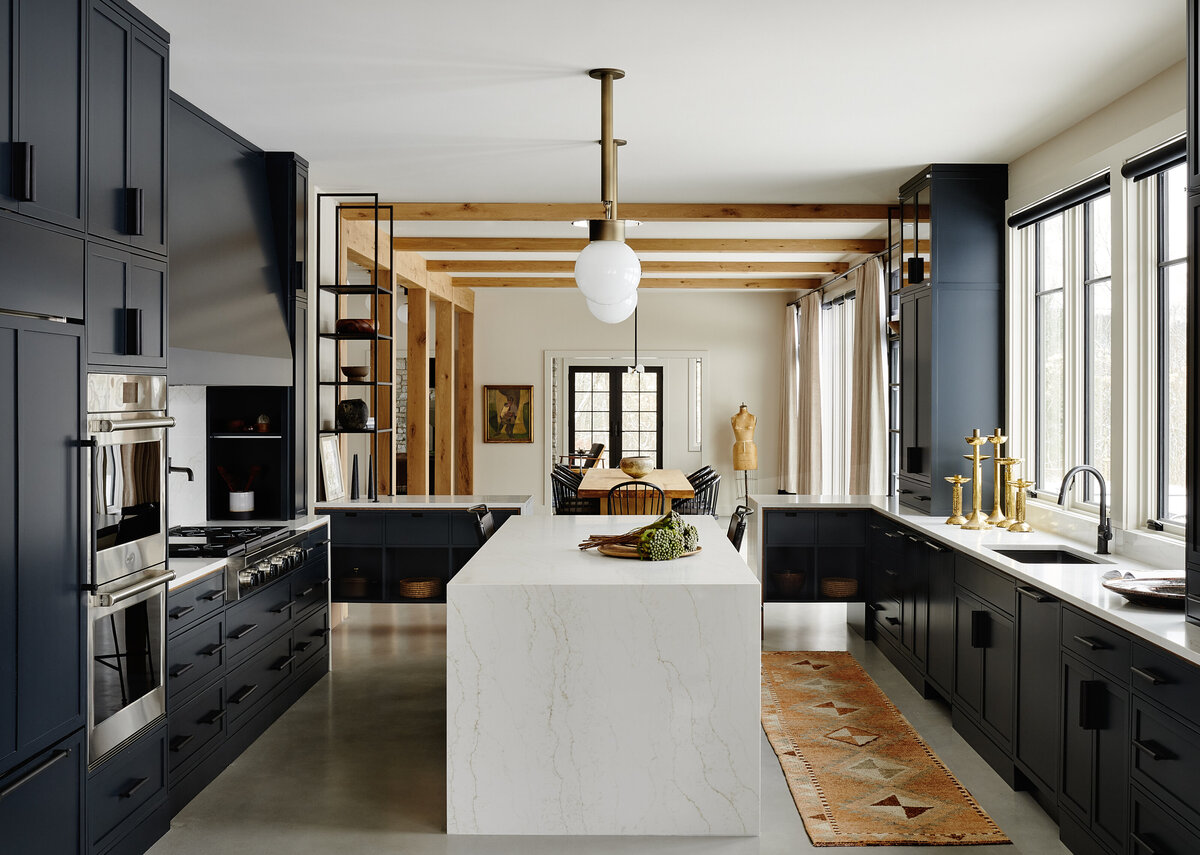 Extensively renovated kitchen in the Catskill and Berkshire mountains with blue cabinetry and open concept.