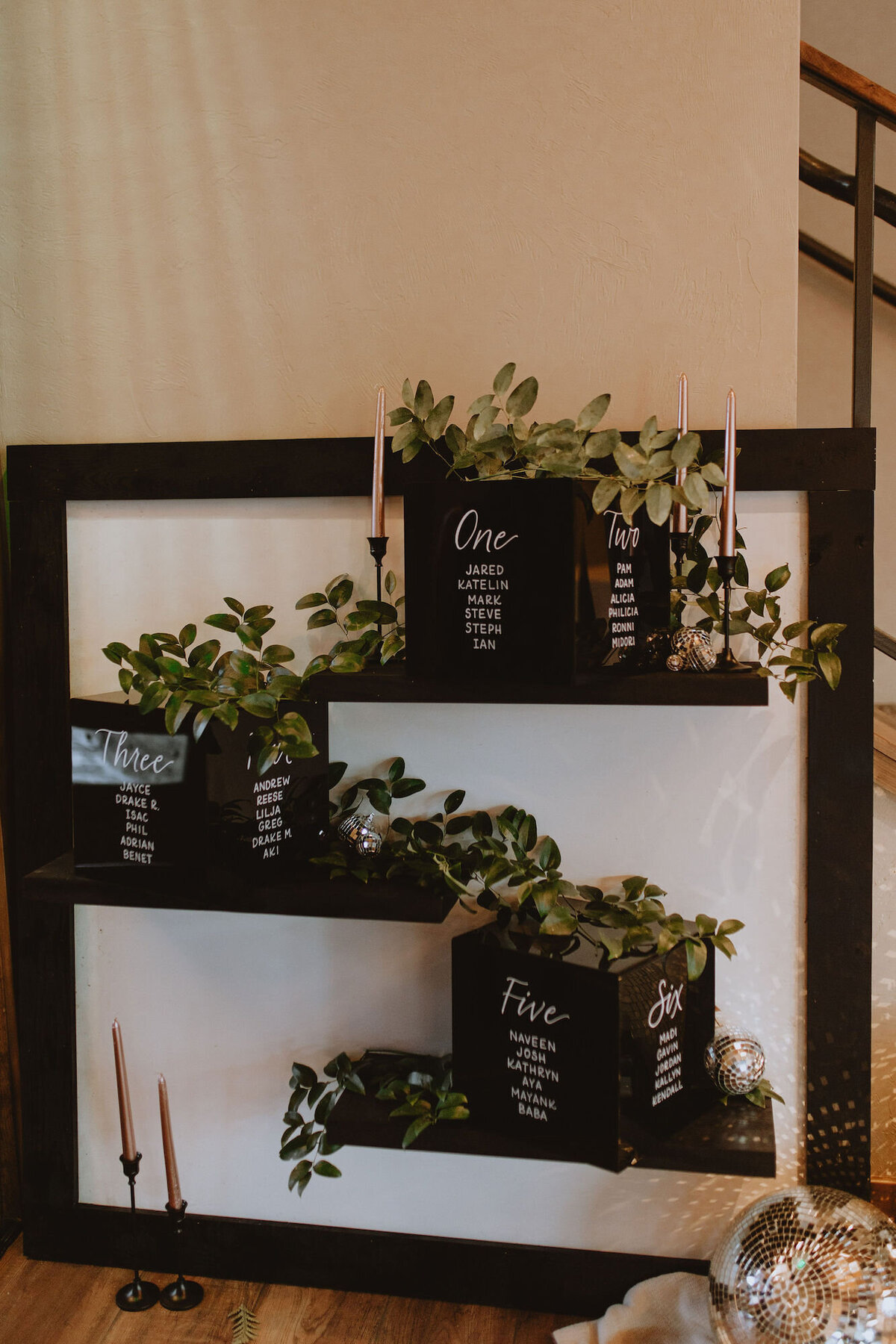 Acrylic box seating chart, black with white calligraphy lettering