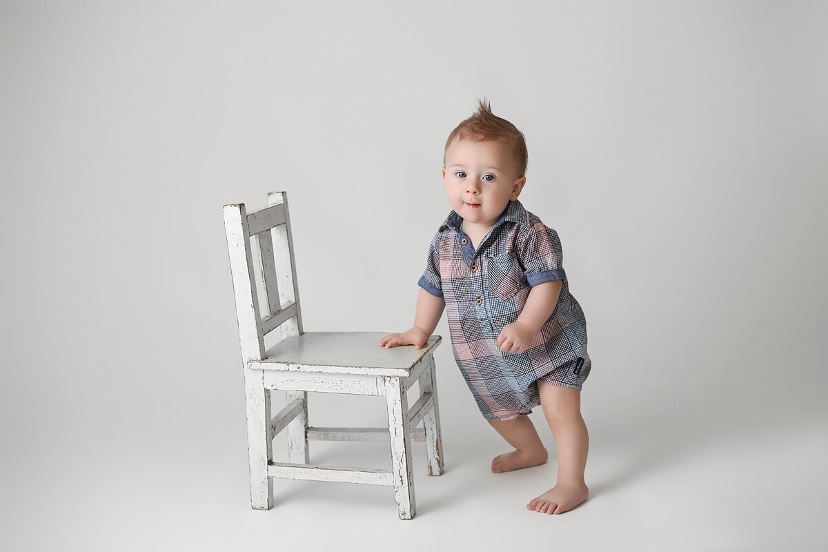 1 year old boy with chair