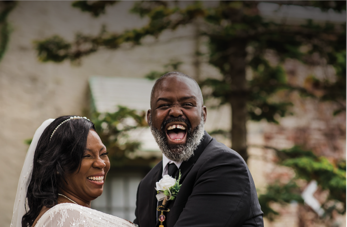 bride-and-groom-laughing@2x