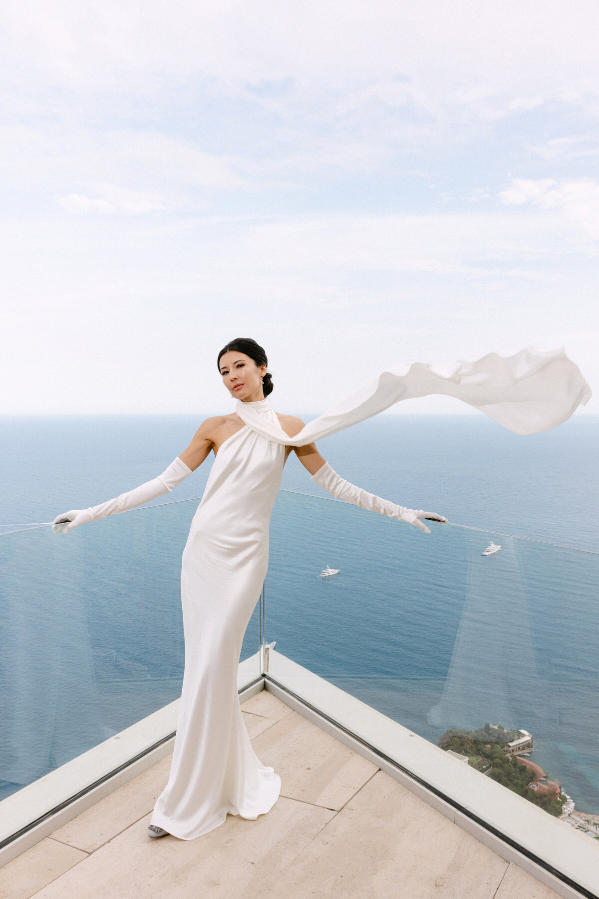 Elegant Bride posing in the terrace of The Maybourne Riviera at Roquebrune-Cap-Martin, France