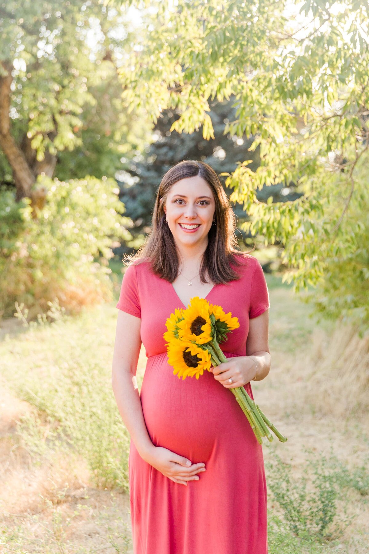 maternity session with sunflower boutique in Boulder Colorado