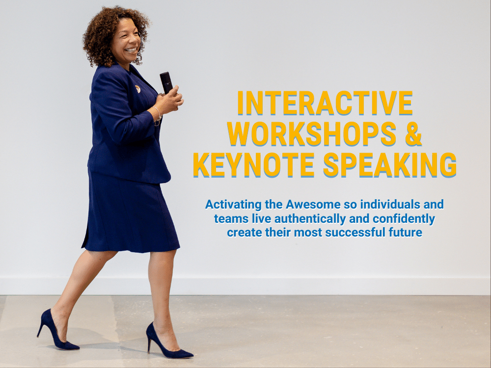Image of Michelle McKown-Campbell in a dark blue suit smiling and  walking in blue pumps  while giving a presentation. Photo overlayed with text that reads, "Interactive Workshops & Keynote Speaking" followed by "Activating the Awesome so people and teams can live authentically and confidently create their most successful futures" underneath