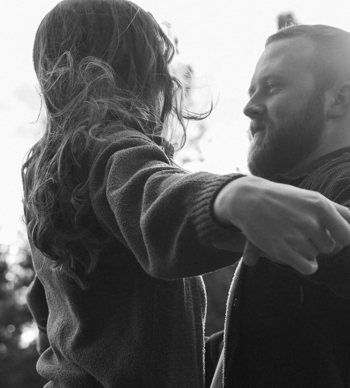 artistic image of engaged couple looking into each other's eyes in Bend, Oregon