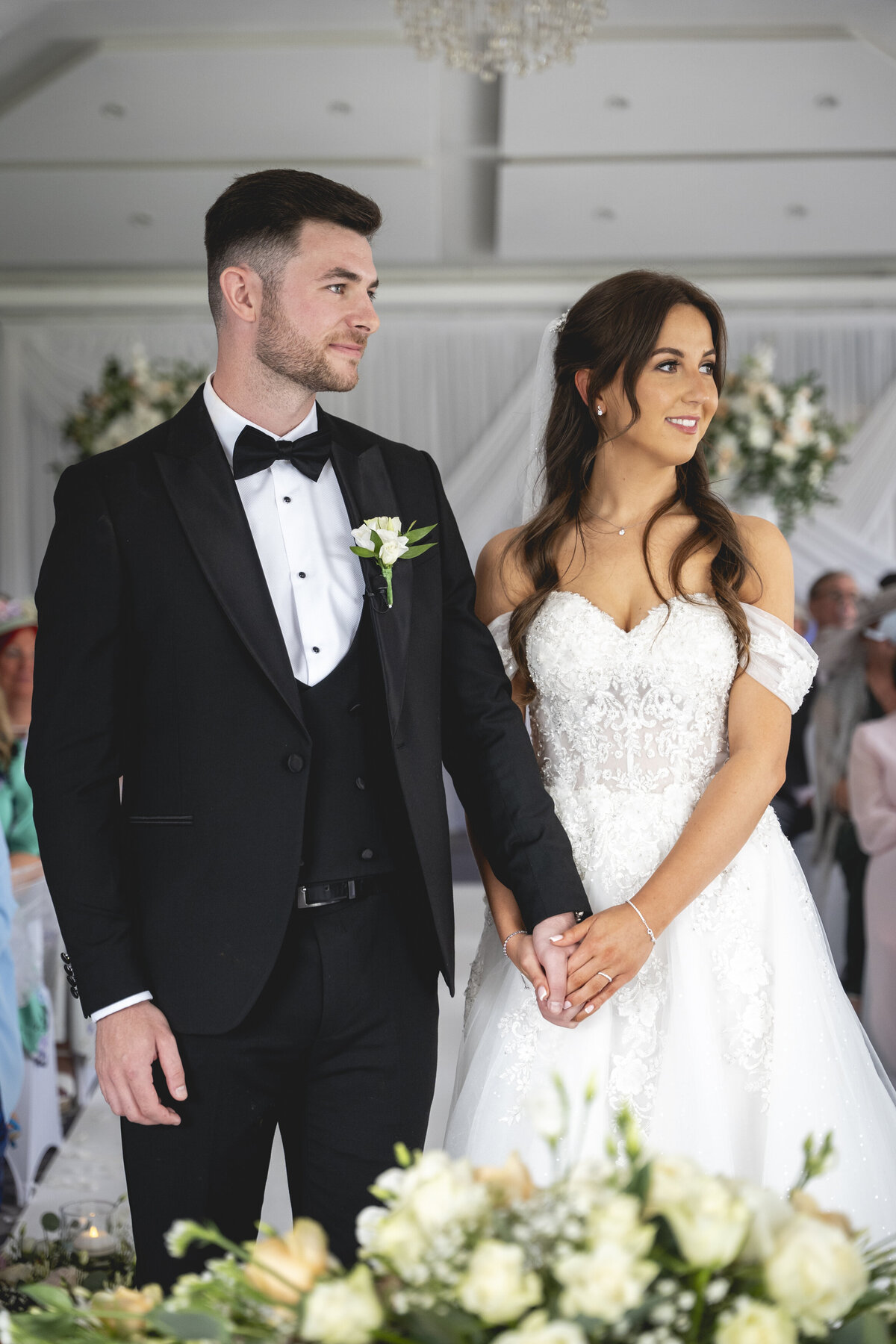Holding hands during ceremony