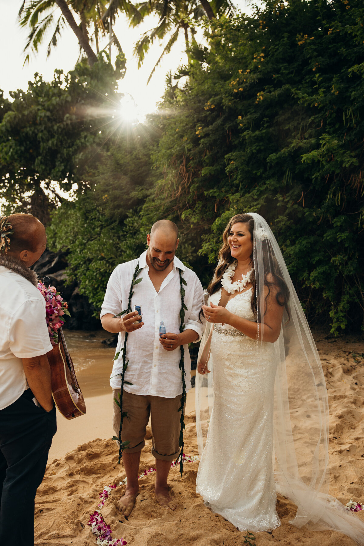 Maui Wedding Photographer captures bride and groom reading vows