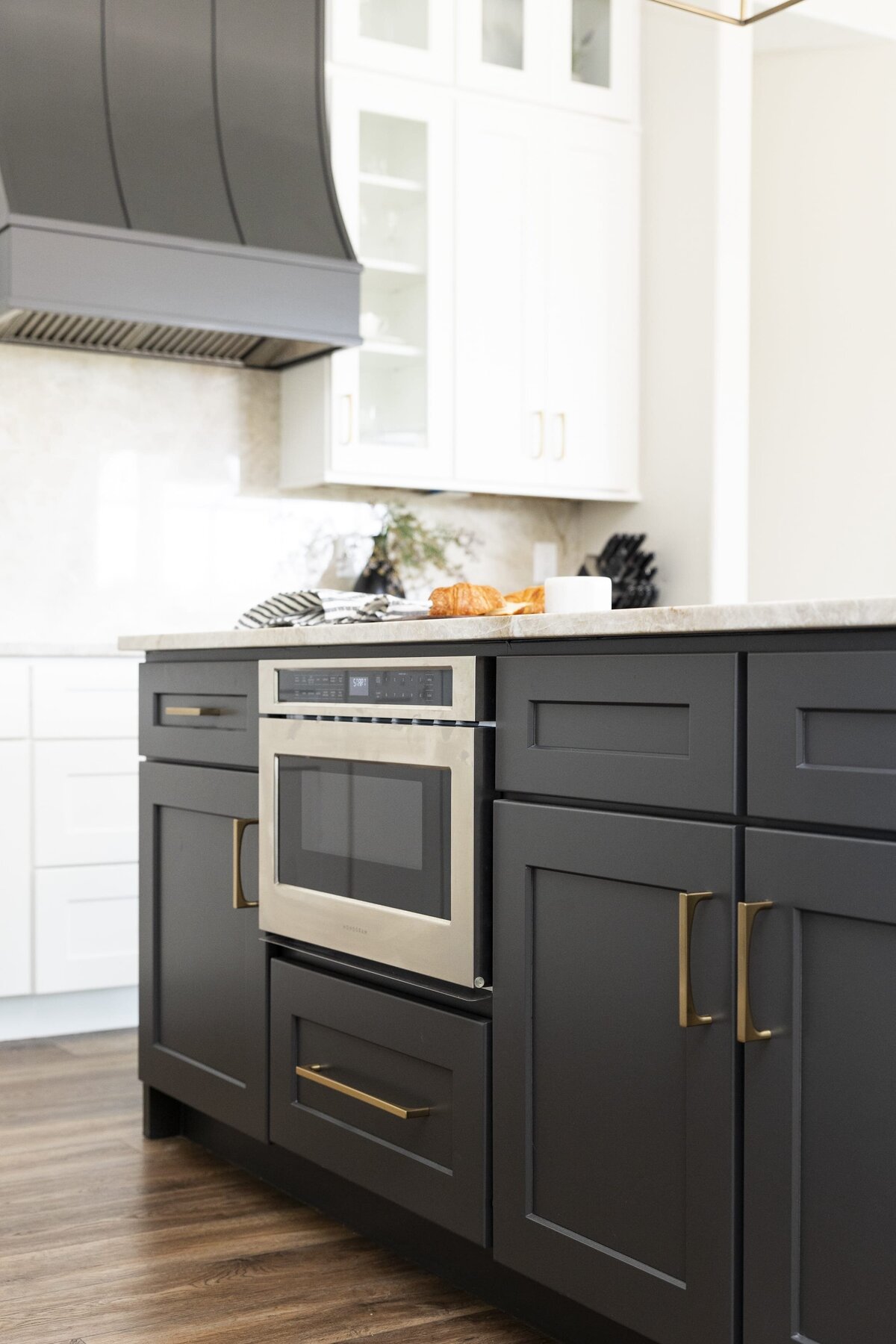 dewine design orlando interior designer windermere full home renovation kitchen dark lower cabinets with gold handles