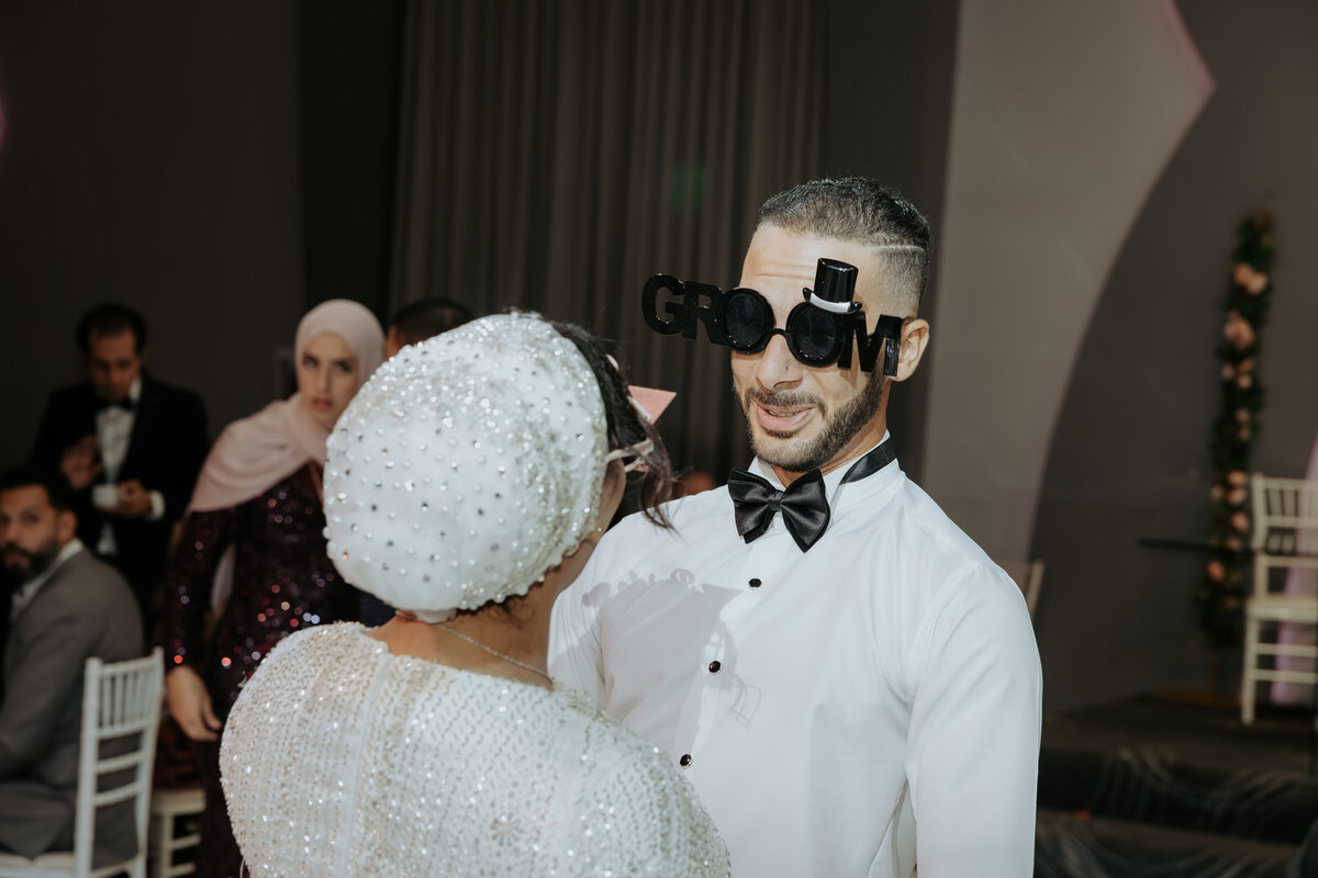 Groom Wearing “Groom” Glasses – Unique Wedding Moments in LA