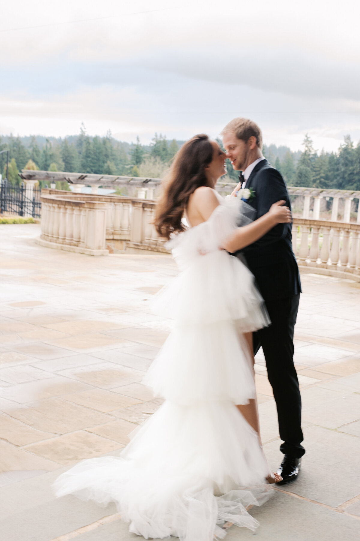 luxury wedding couple wearing claire la faye gown during their first dance